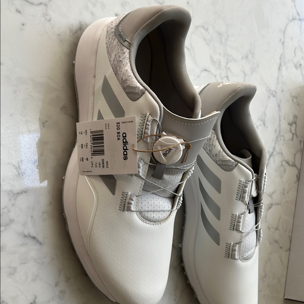 Adidas White and Gray Athletic Shoes with Cushioned Comfort